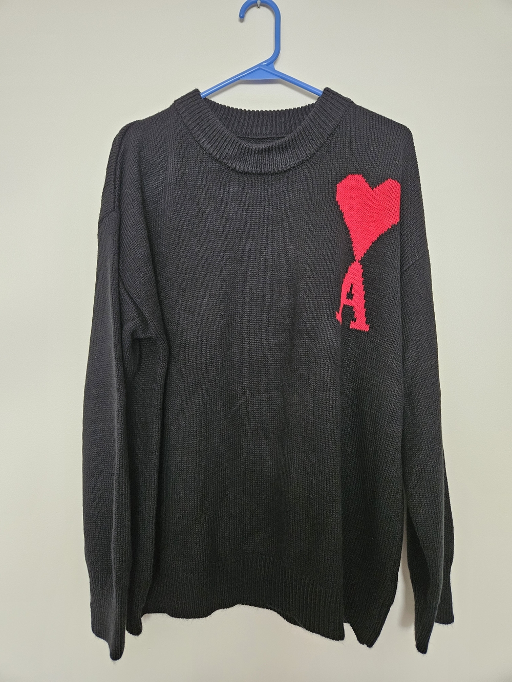 Black Knit Sweater with Red Heart Detail